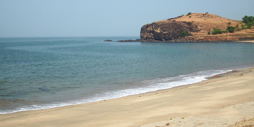Diveagar Beach features golden sands, gentle waves, and serene coastal beauty near Shrivardhan Fort