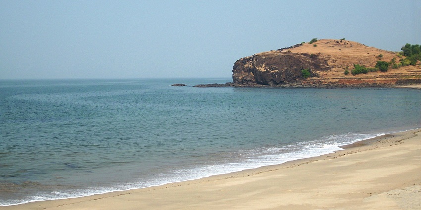 Scenic view of Diveagar Beach, surrounded by clear waters during the monsoon.