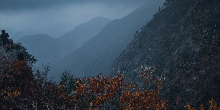 An image of an iconic rock formation with panoramic views of surrounding landscapes.