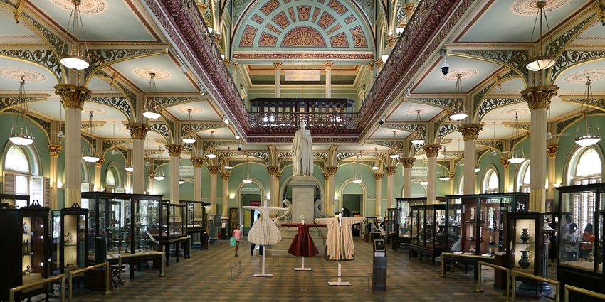 Interior view of the Bhau Daji Lad Museum, showcasing elegant columns and detailed artifacts