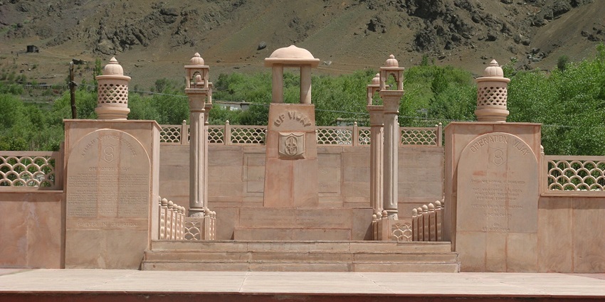 Dras War Memorial is a Kargil war memorial with a pink sandstone wall and a brass plate