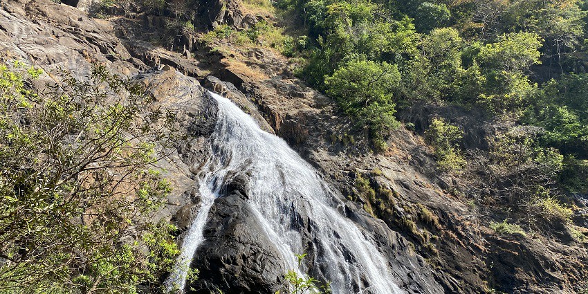 Watching the flow of water at Dudhsagar, a preferred thing to do in Goa in april