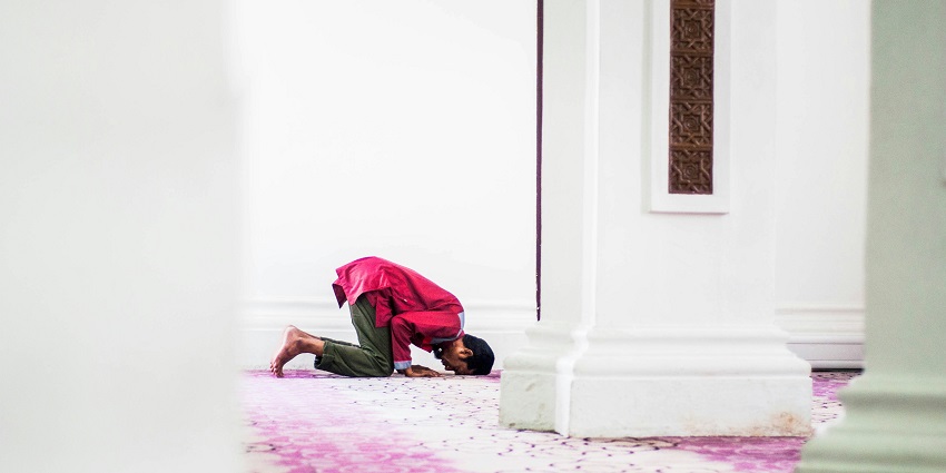 An individual embracing each other on Eid-ul-Adha, a festival in Lakshadweep, India.
