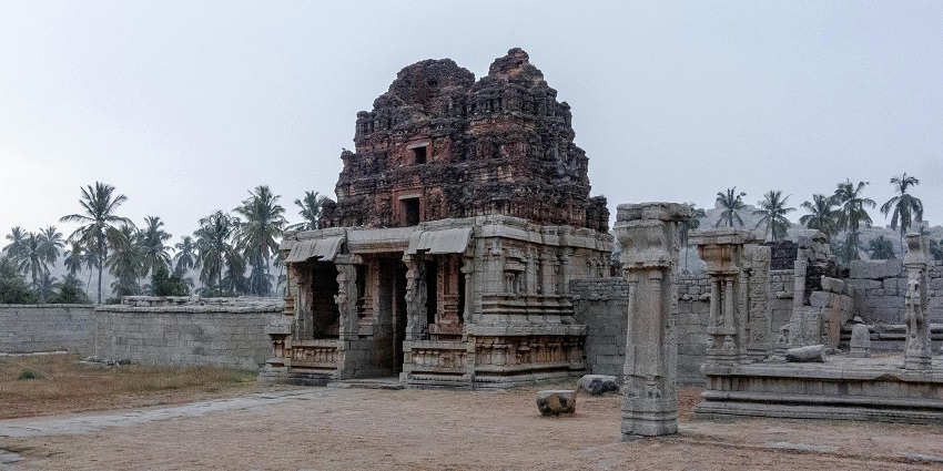 An image of one of the popular temples in Tamil Nadu showcasing detailed stone carvings.