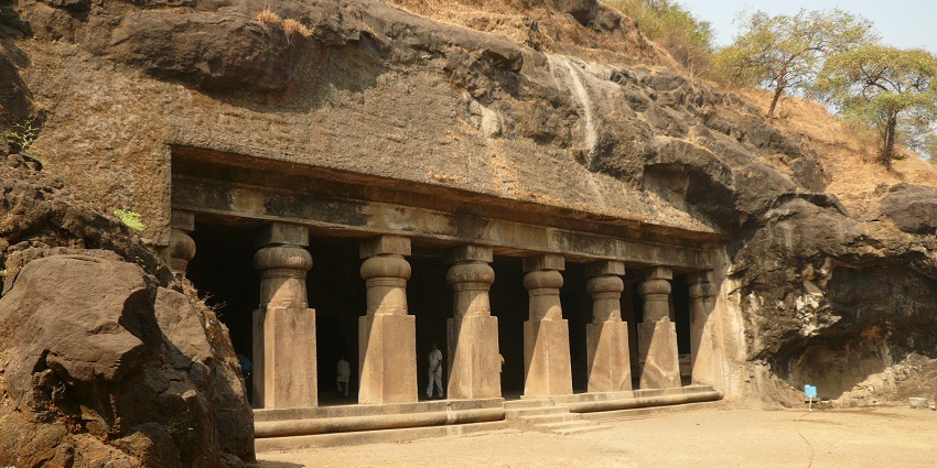 Elephanta Caves, known for stunning rock carvings, near Jehangir Art Gallery.