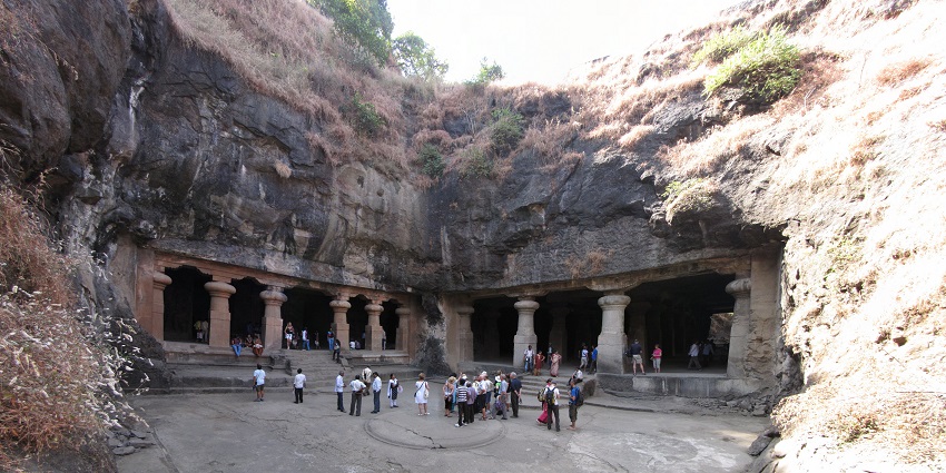 Elephanta features stunning caves adorned with intricate rock-cut sculptures.
