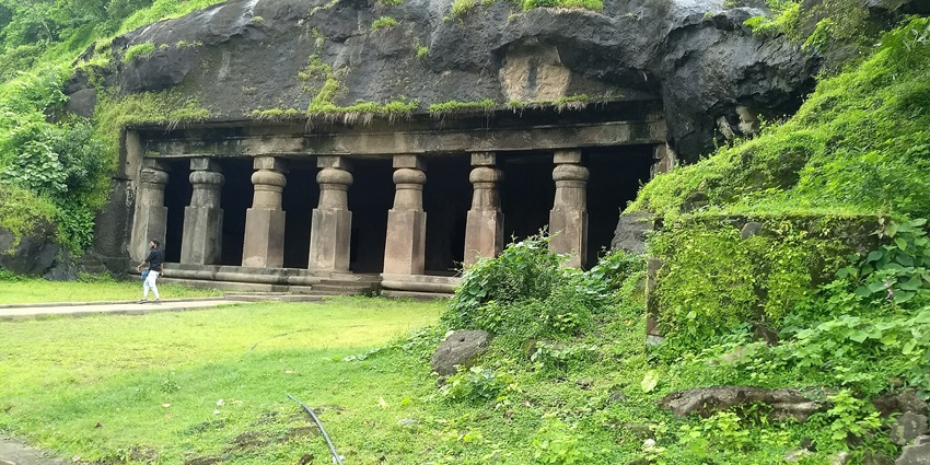 Scenic view of Elephanta Caves showcasing intricate rock sculptures. It is one of the best place to visit near gateway of India.