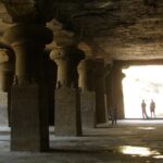 View of Elephanta Caves, a tourist attraction near Karnataka, showcases ancient sculptures.