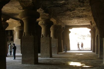 View of Elephanta Caves, a tourist attraction near Karnataka, showcases ancient sculptures.