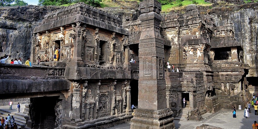 The Ellora Caves display ancient Indian artistry with intricate rock-cut sculptures.