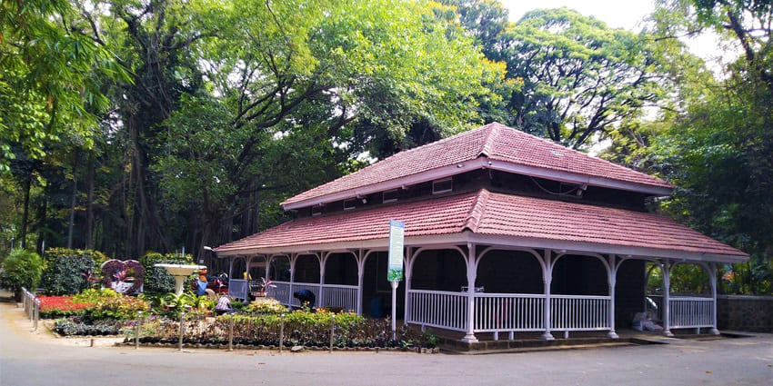 A stunning view of the Empress Botanical Garden with its lush green meadows in the day.