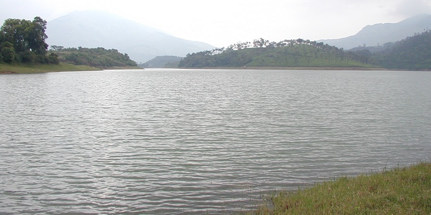 Scenic view of Aanai Erangal Dam, surrounded by nature, a tourist attraction near Madh Fort.