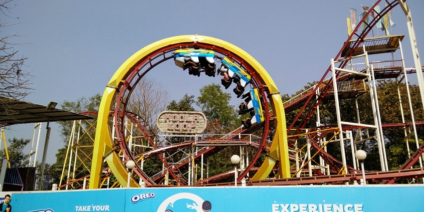 A picture of a rollercoaster at a famous adventure park near the Pagoda Temple