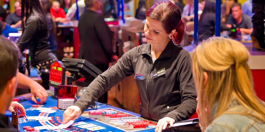 Stacking up cards by a dealer at Event Magic which is a casino in Charlotte, NC.