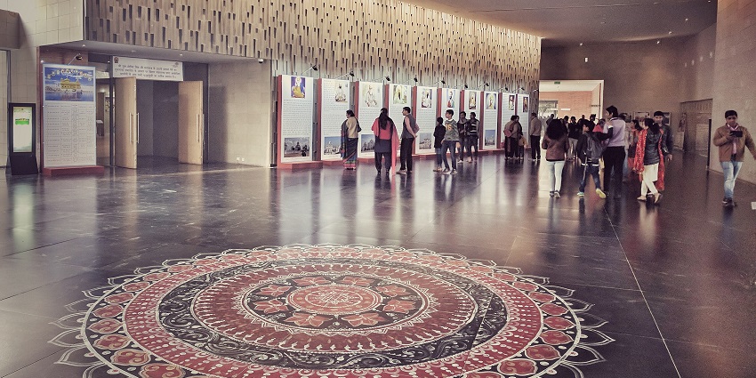 People walking through the halls of the museum