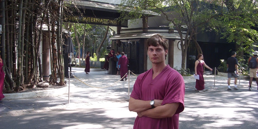 Osho International Meditation Resort entrance in Pune, India, with vibrant greenery.