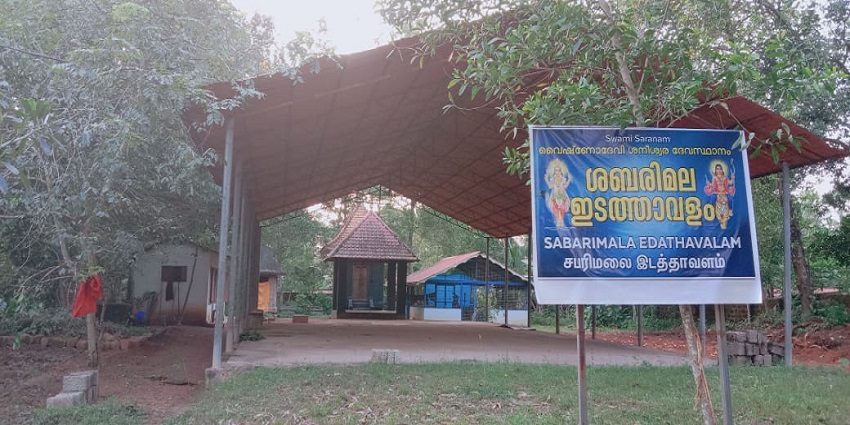 A picture of the Thirunallar Saneeswaran Temple, featuring a large, designed entrance tower.