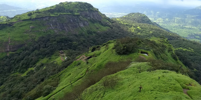 Majestic Rajmachi Fort overlooking lush hills and valleys is one of the top tourist attractions.