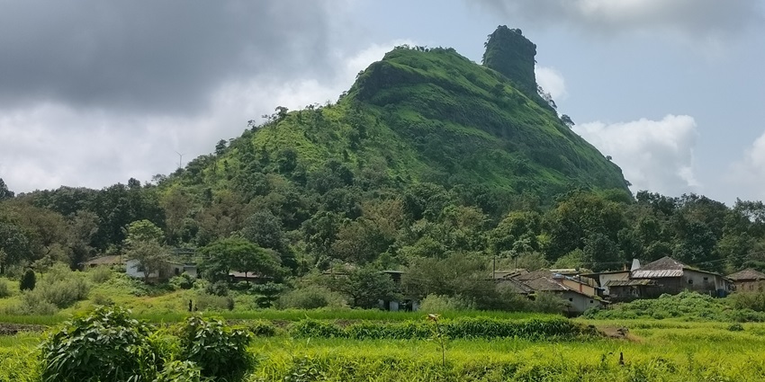 Ruins of Peth Fort set against lush hills, one of the best things to do in Kolad for history lovers.
