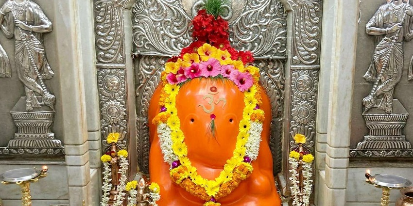 A picture of a Ganesh Idol made with red tilak, at the Chintamani Temple