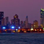 Mumbai skyline at night showcasing illuminated buildings and city lights