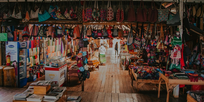 A market shop crowded with antique goods, just like the shops of the Ramanagara Town Market.