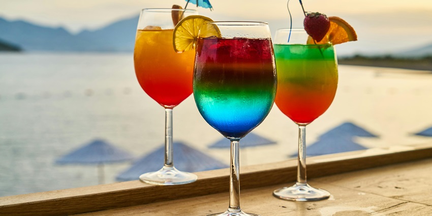 Express Inn featuring glasses of vibrant drinks during the New Year party in Nashik.