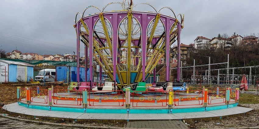 Colorful entrance of Fantasy Land leisure hub with vibrant decorations and attractions.