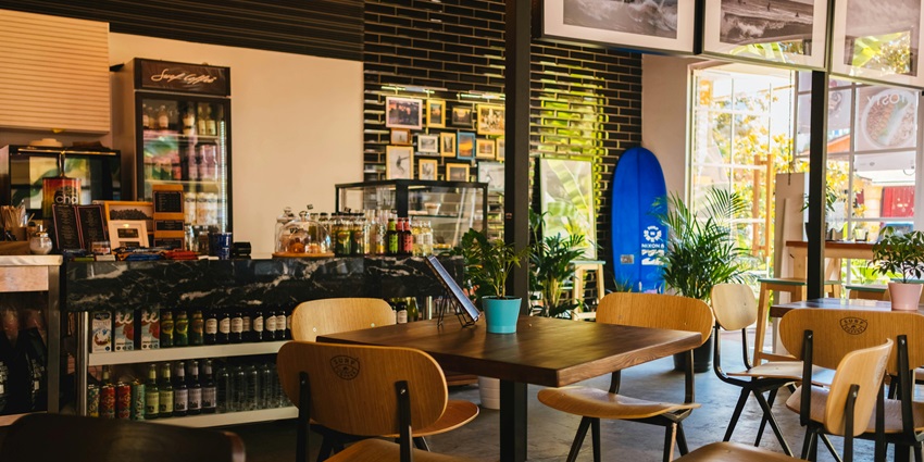 A picture of a cosy cafe in Gurgaon with a lively ambience and seating areas