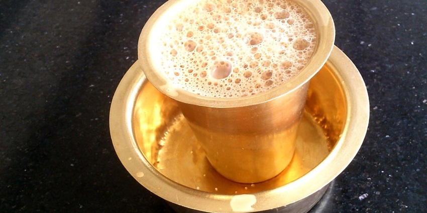 Image of strong, aromatic South Indian coffee brewed using a metal filter