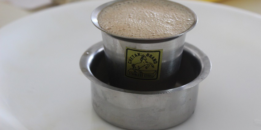 Strong, aromatic South Indian coffee served in traditional style.