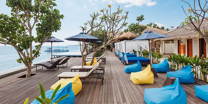 Finns Beach Club with people enjoying the pool and resort amenities