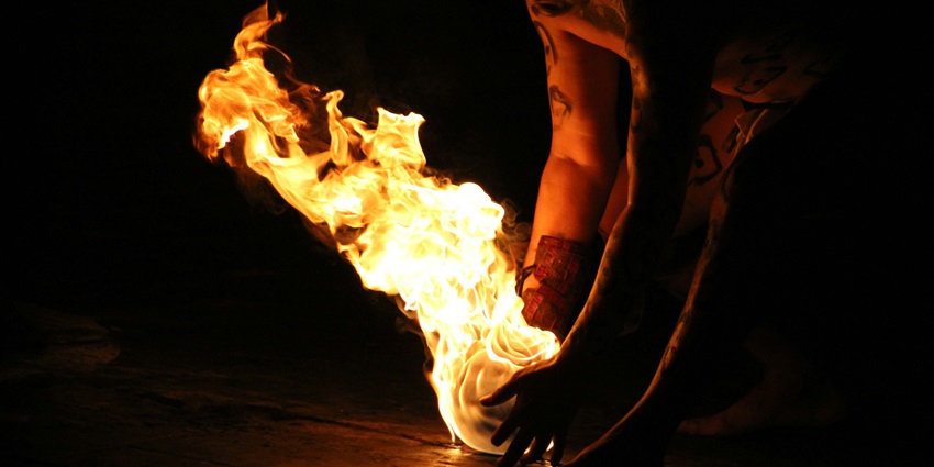 A glimpse of the iconic fire dance performances at night in Arambol Beach in Goa.