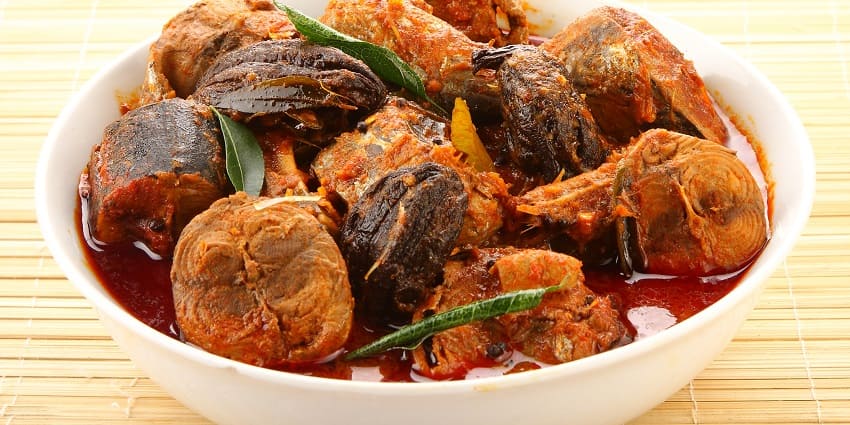 Spicy, tangy South Indian fish curry made with tamarind.