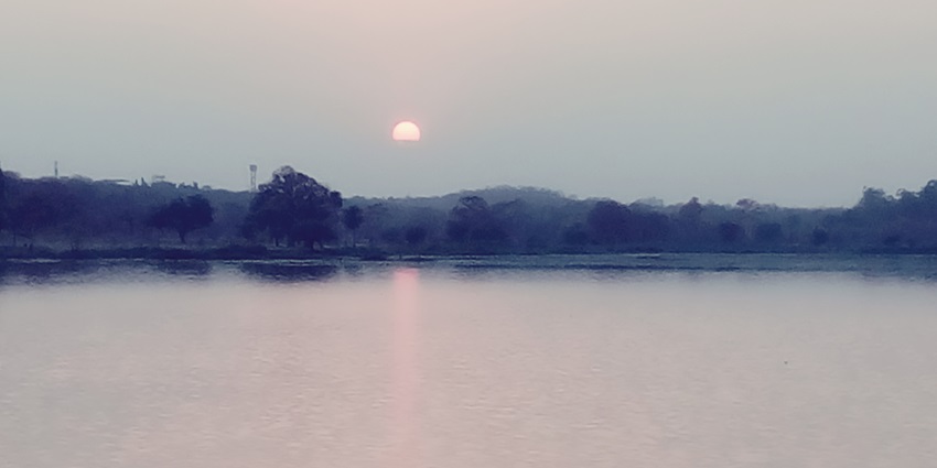 Stunning sunset view over Futala Lake, a famous place near Fun Planet Water Park.