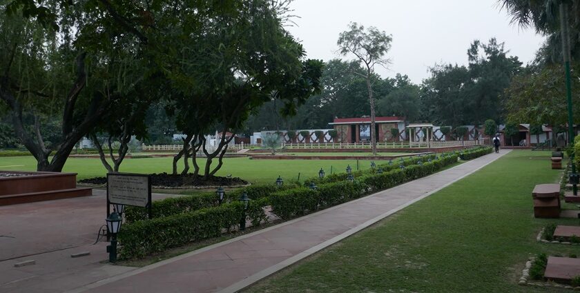 Gandhi Museum National Park with walking paths surrounded by greenery and sculptures