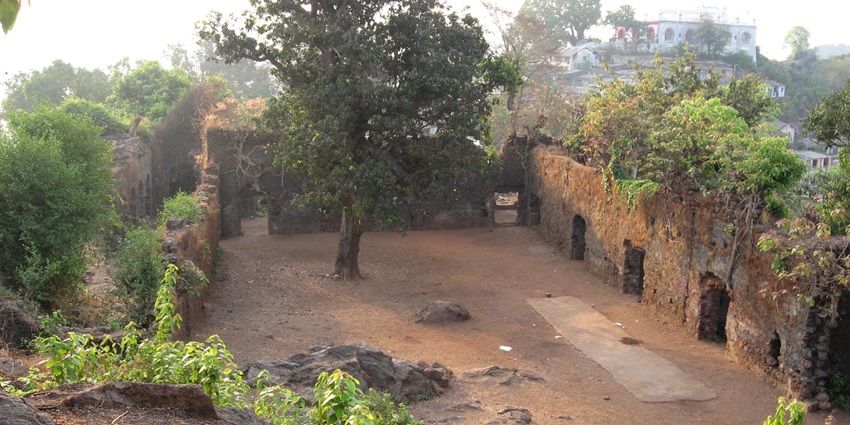 An aerial view of the ruined courtyard of a historical fort, located near Mira Road