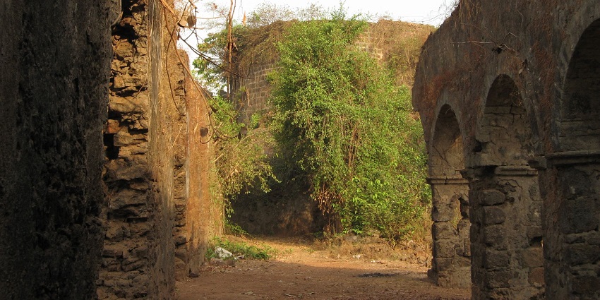 Ghodbunder Fort, an old fort with impressive stone structures and scenery.