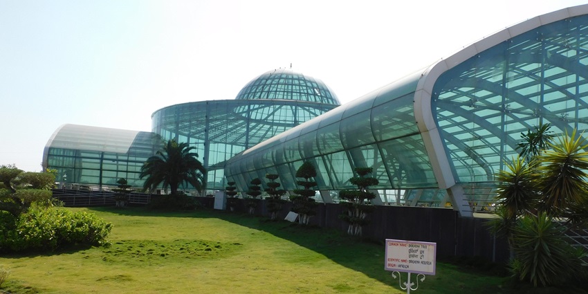 Scenic image of the beautiful Glass house which is a Botanical garden built around a lake