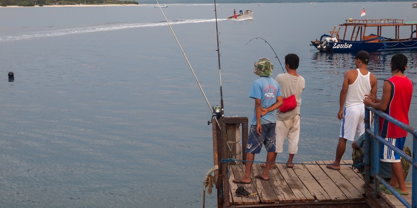 The fishermen catching fish on the Gili Islands, West Nusa Tenggara, Indonesia.