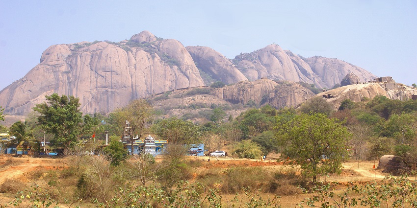 Trekking on Savanadurga Hill, a popular adventure spot, one of the best things to see in Kanakapura.