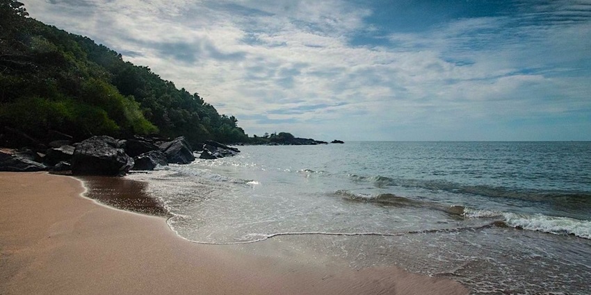 the tranquil charm of Halfmoon Beach, Gokarna, a gem among popular beaches in Karnataka.