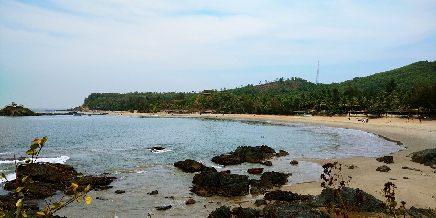 The Gokarna Beach features stunning coastline, water sports, and vibrant nightlife.