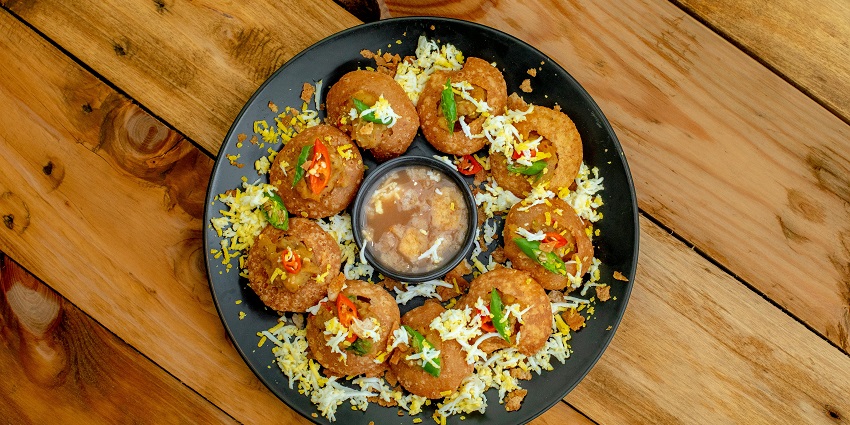 Snapshot of the delicious and mouth-watering Gol Gappe served with sauce