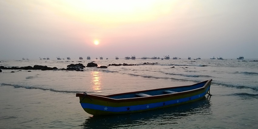 Charming boat resting by Gorai Beach, a famous place near Essel World Water Park.
