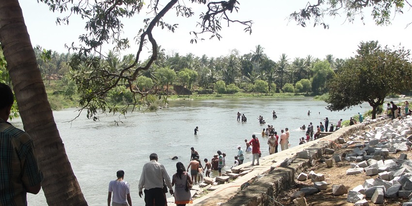 A peaceful riverside ghat with temples and flowing waters, perfect for meditation and rituals.