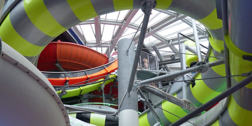 A vibrant water land with thrilling slides and a wave pool.