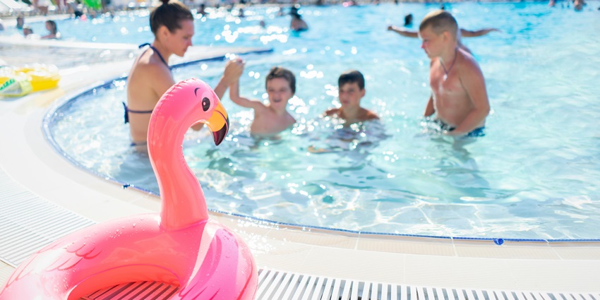 An image showing a family enjoying the pool at one of the top water parks in Virar, Palghar.