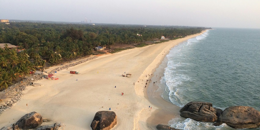 An aerial view of the picturesque Guhagar Beach featuring shimmering blue waters.