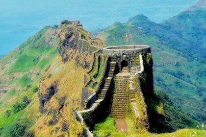 Majestic view of Gumtara Fort perched on a hill and surrounded by lush greenery.